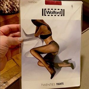NWT- Wolford fishnets in hibiscus color🌺